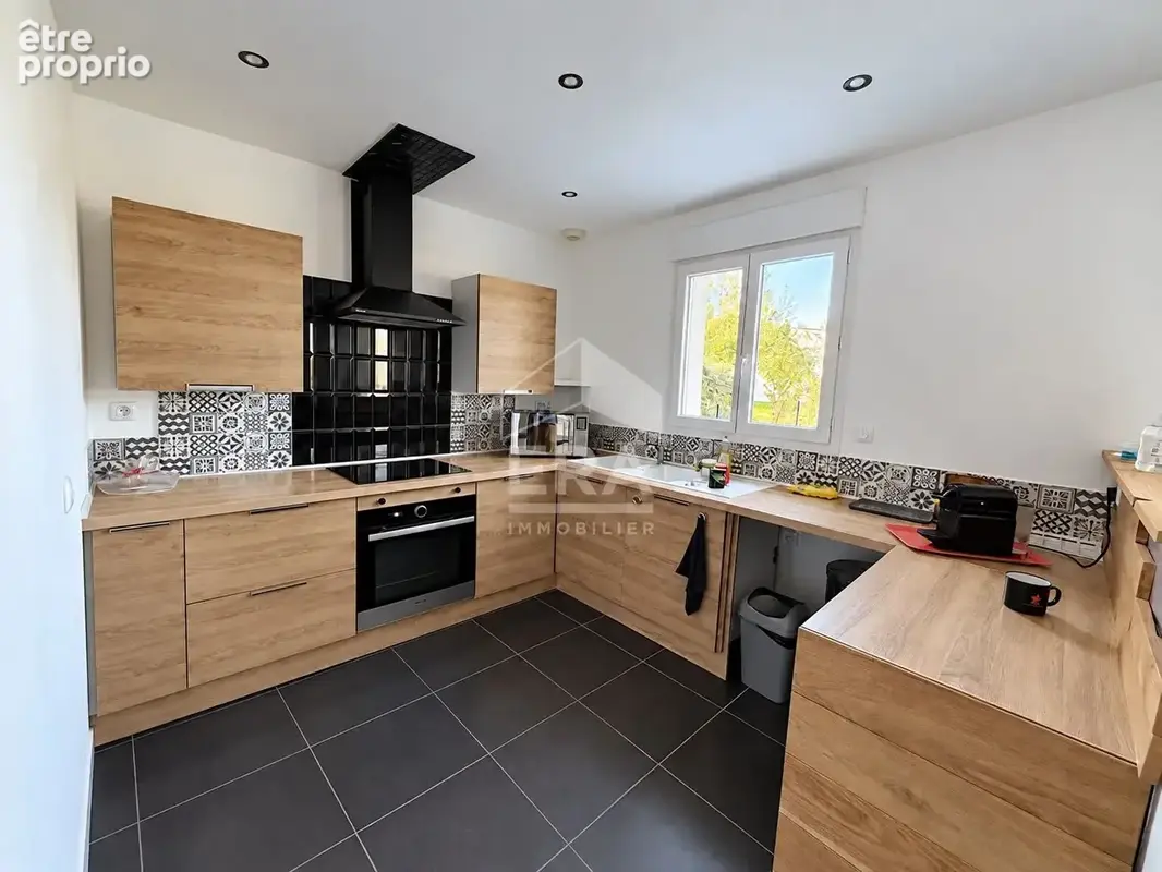 Maison 90m² à saint-georges-des-coteaux - photo 2
