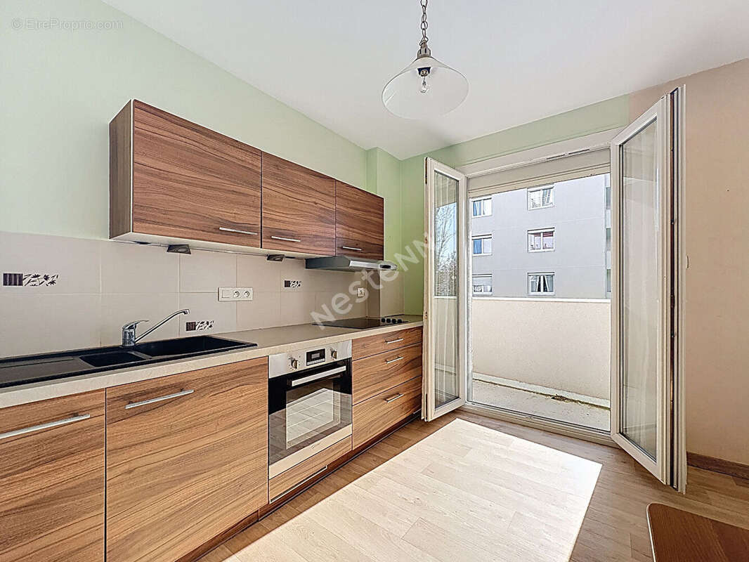 Appartement 2 chambres avec cave et place de parking - photo 2