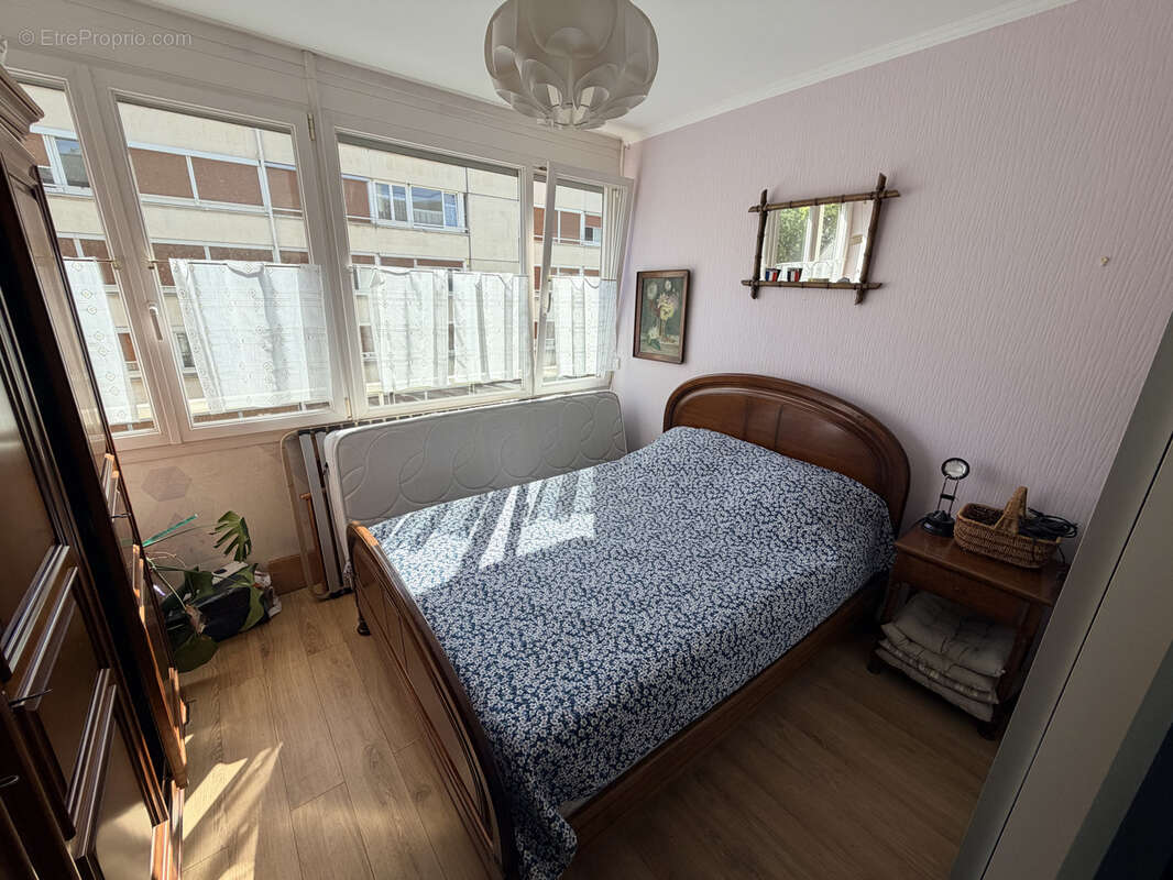 Reims - Appartement 4 pièces avec balcon et place de parking en sous sol - photo 7