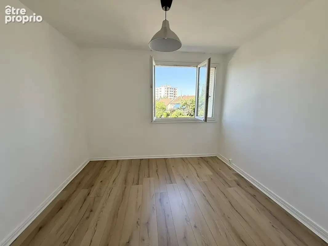 Appartement T3 avec cave et parking - photo 4
