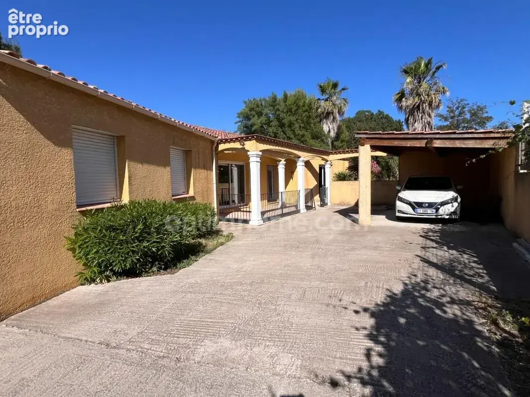 Maison de plain-pied 155 m² avec garage de 92m2, piscine et terrain arboré à MONTAGNAC (34) - photo 8