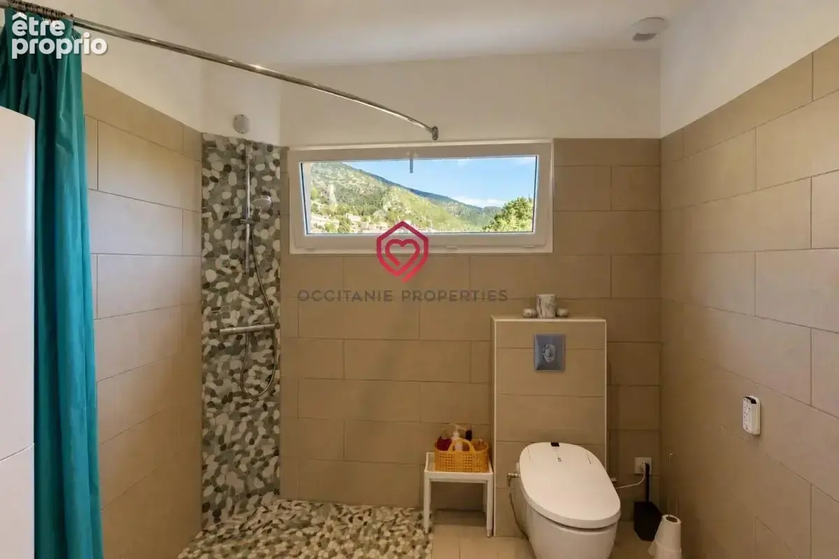Villa récente de plain-pied avec piscine et vue sur Roquebrun - photo 14