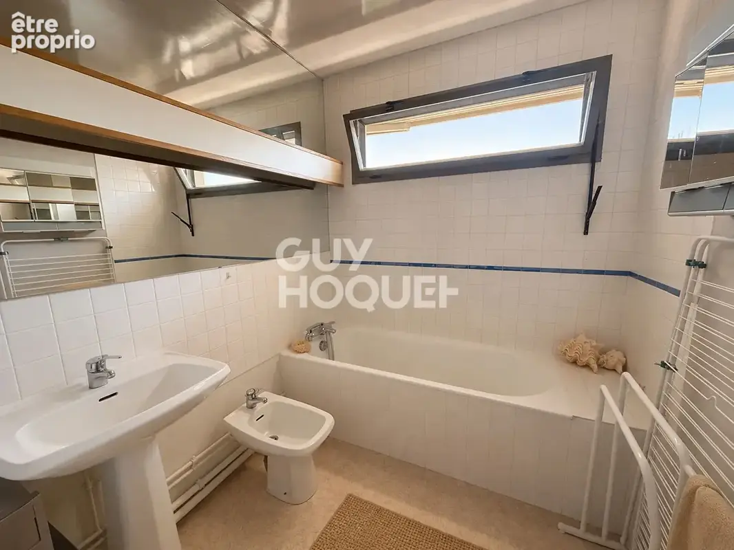 CLERMONT FERRAND- Appartement dernier étage 94 m2, balcons et parking - photo 9