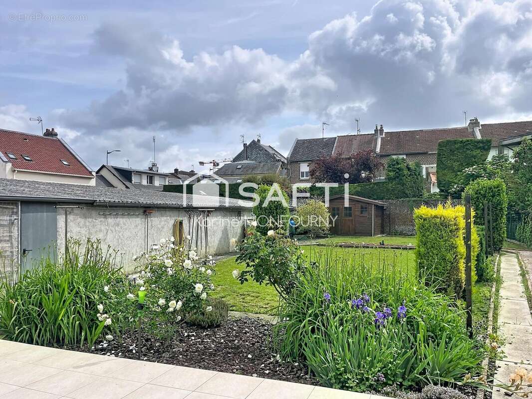 Photo 2 - Maison à SAINT-QUENTIN
