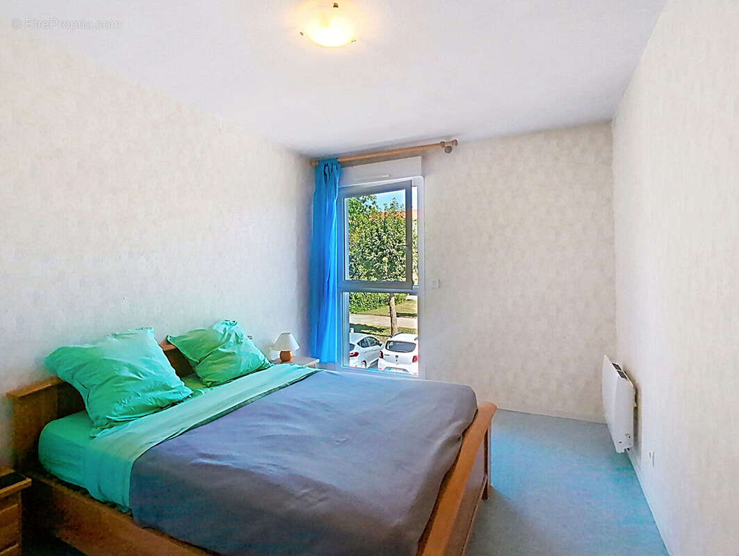 Appartement T3 - 64.37 m2 avec cave, balcon et parking - photo 11