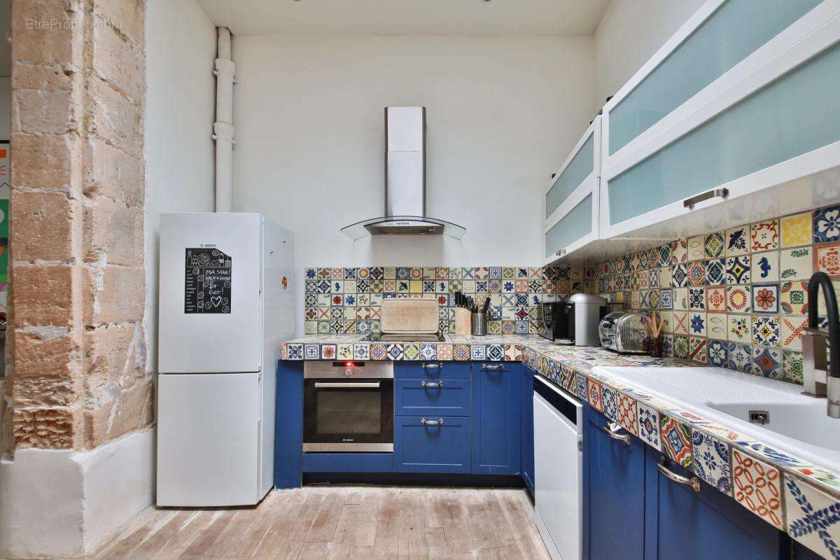 Loft 87 m² Paris 4e - Charme et lumière - photo 5