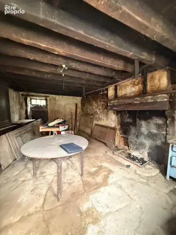 EN EXCLUSIVITE ! Maison en pierre 57m² à restaurer avec grange et garage sur terrain 486m² 29 900 € - photo 2