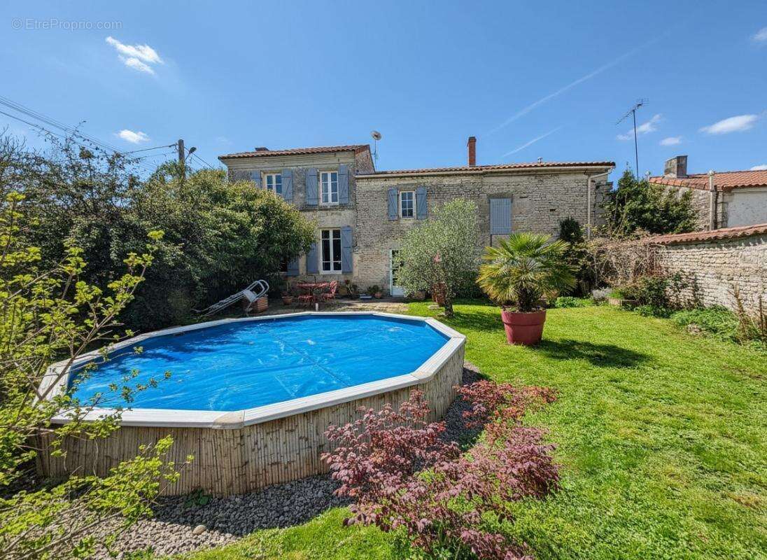 Maison à COURBILLAC