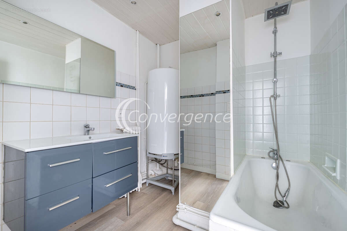 Appartement T4 rénové avec 3 chambres et ascenseur - photo 10