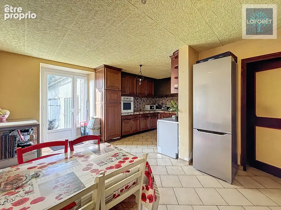 Immeuble de rapport : 2 maisons + local commercial - photo 5