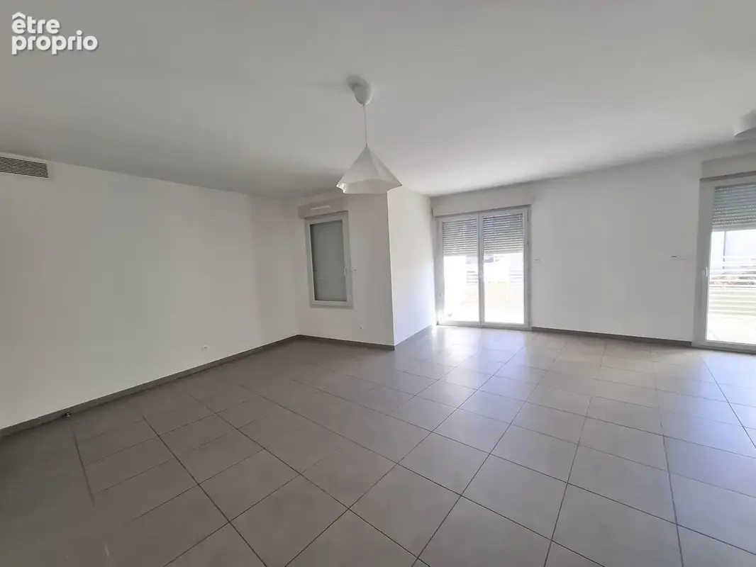 Appartement T4 lumineux avec terrasse et garage   Centre de Quincieux - photo 3
