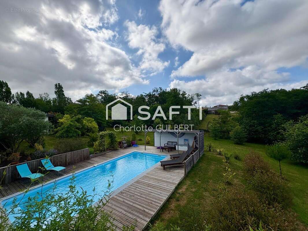 Photo 2 - Maison à CASTELNAU-SUR-GUPIE