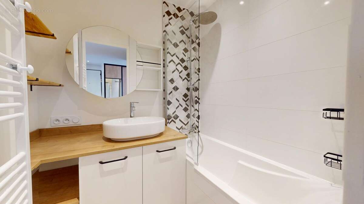 Appartement T4 rénové avec balcon – Résidence calme et sécurisée - photo 11