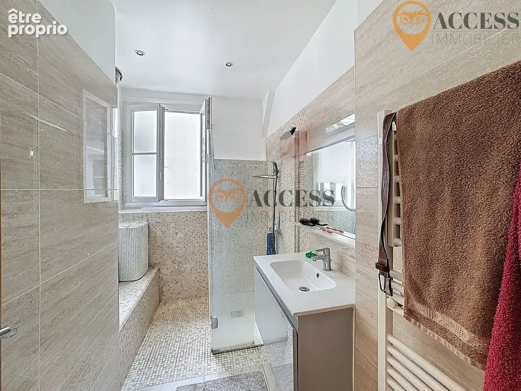 EPINAY-SUR-SEINE - Appartement de 56m2 proche d'Enghien avec cave - photo 6