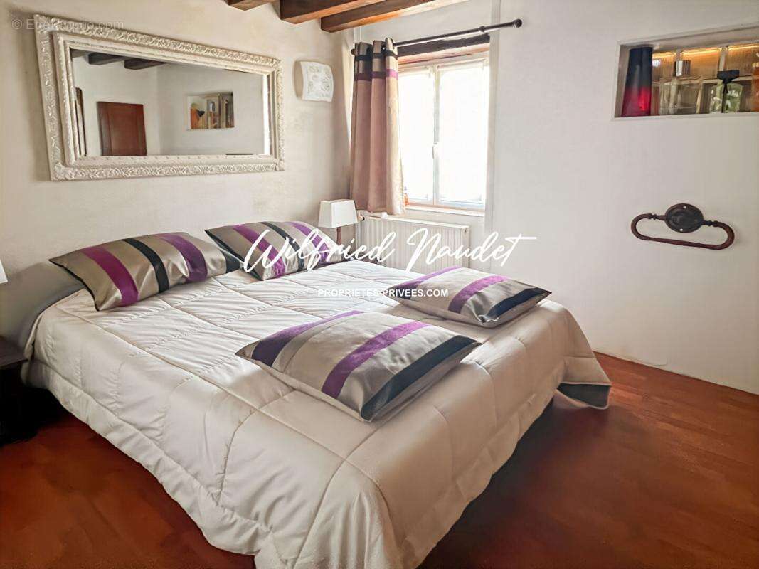 Maison à PARIGNE-L'EVEQUE