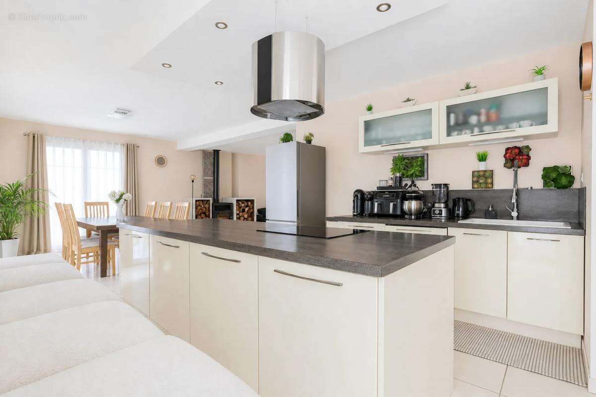 Maison de 170 m² à Tartigny avec jardin spacieux - photo 2