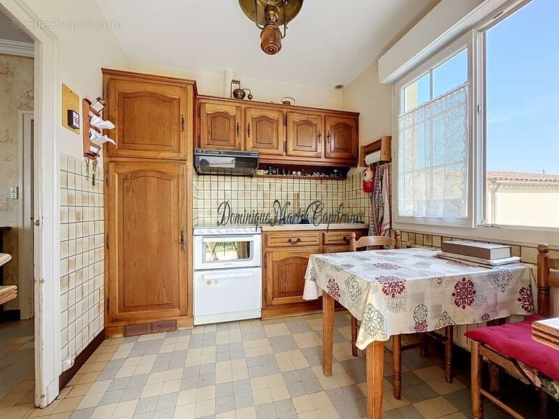 Maison à vendre 4 pièces LHOMME (72)-Maison de plain-pied à réinventer – Petit prix, emplacement idéal au cœur de Lhomme ! - photo 2