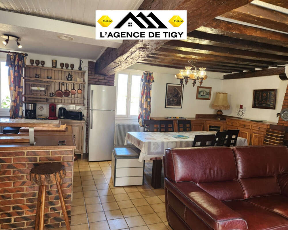 A vendre une charmante maison - photo 3