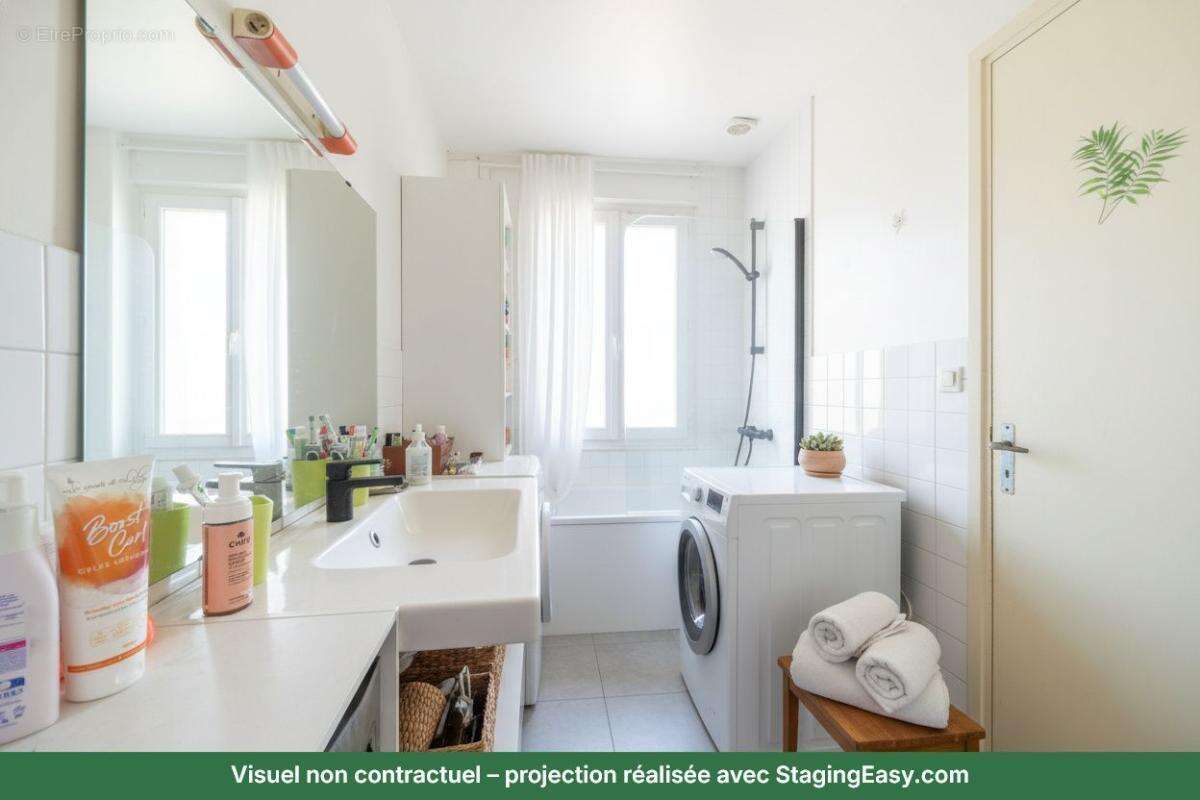Appartement T4 - CHARNAY LES MACON - Ascenseur, balcons, place privative et cave - photo 12