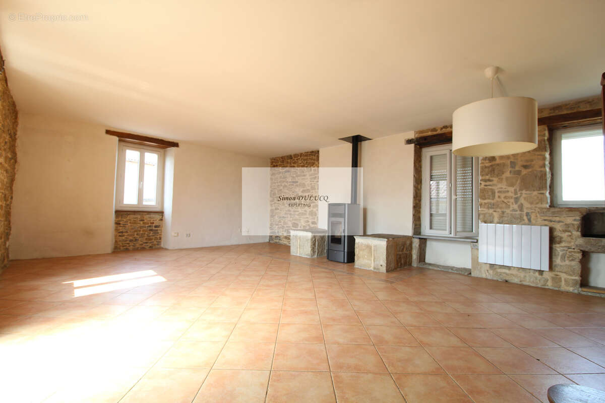 Maison 170 m2 scindee en 2 logements avec cour et cave - photo 6