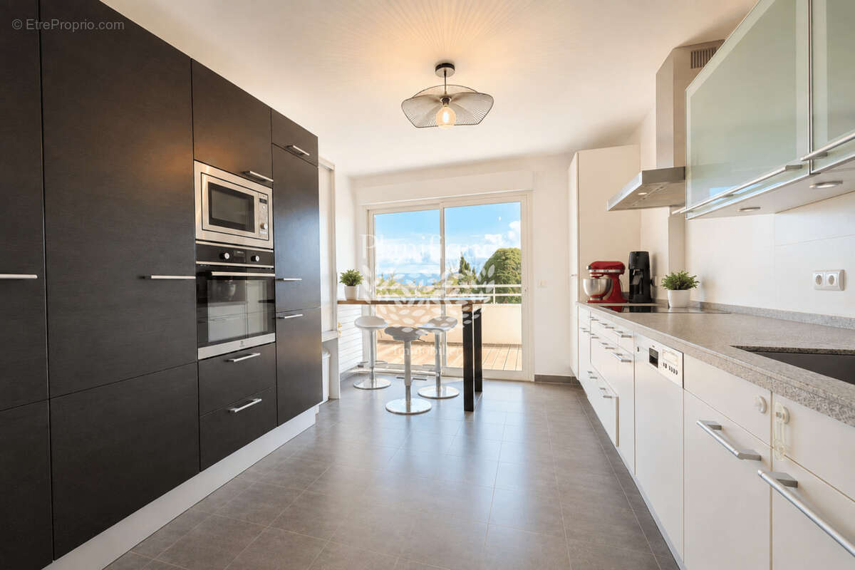 Splendide T5 à Divonne-les-Bain, 54 m2 de terrasse - photo 3