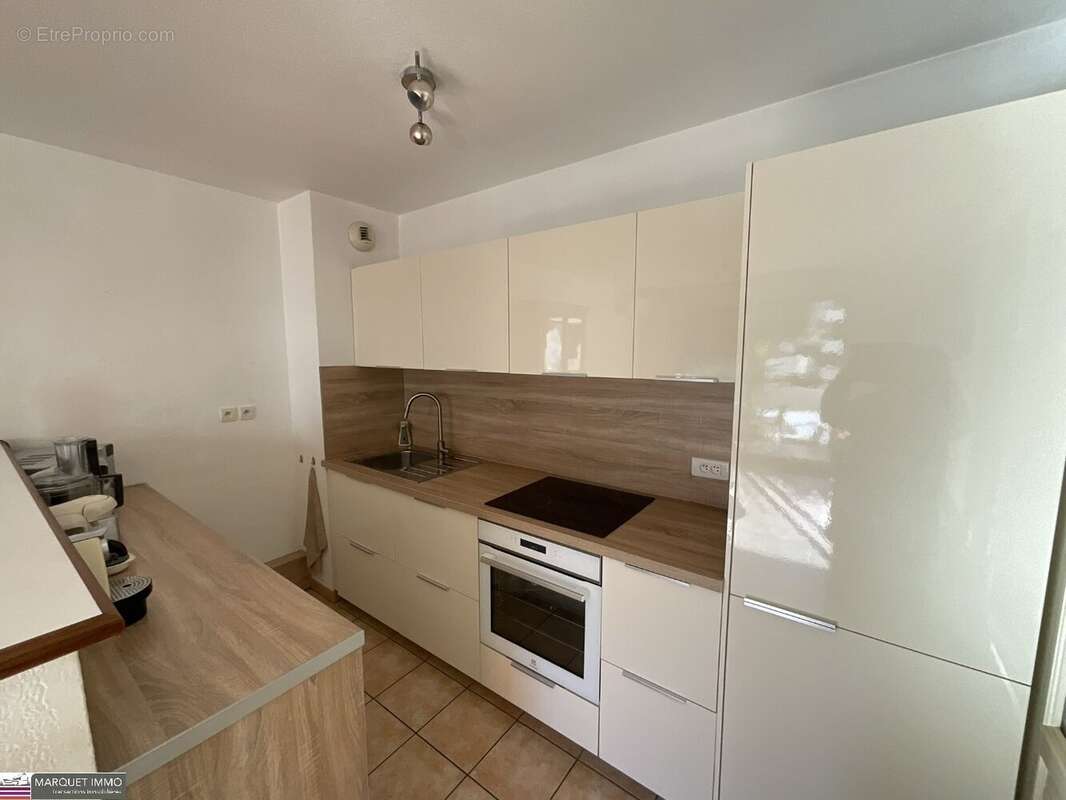 Agréable appartement T3 offrant 51 m² avec terrasse de 6 m² en rez-de-jardin d'une résidence sécurisé avec des espaces verts des - photo 3