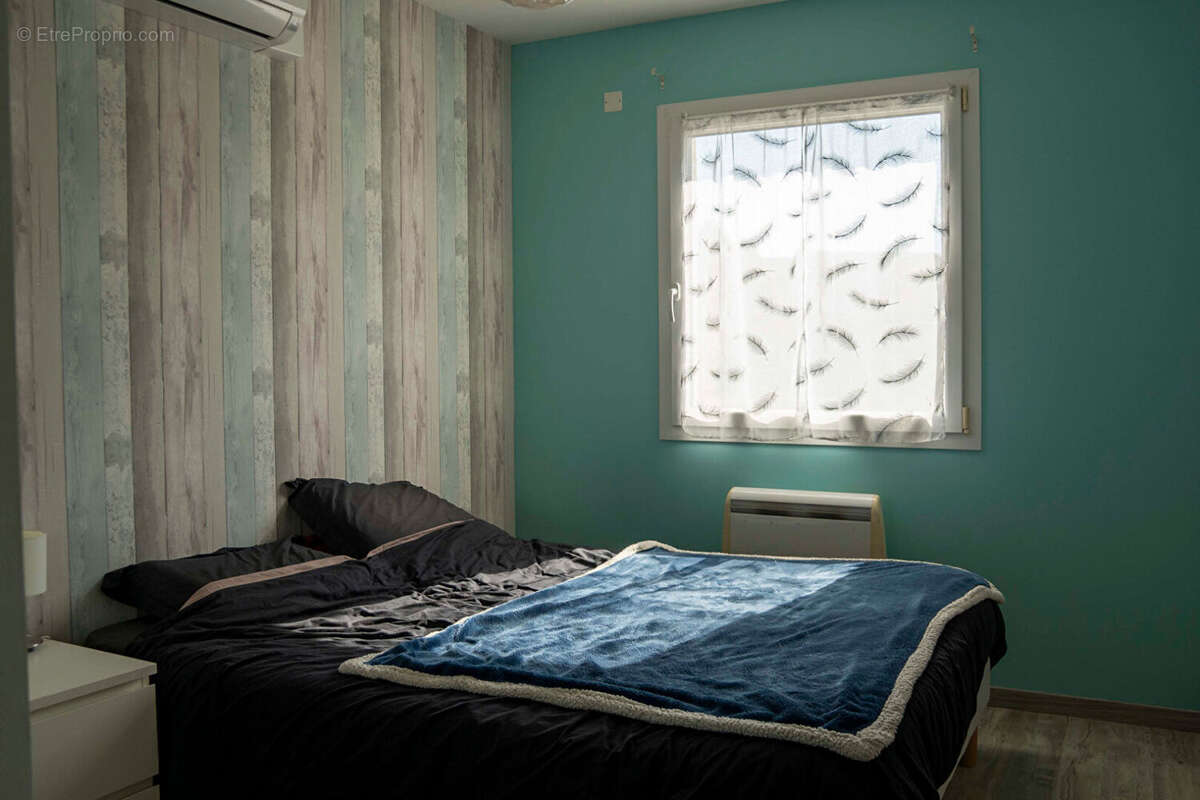 Maison à POUILLEY-LES-VIGNES