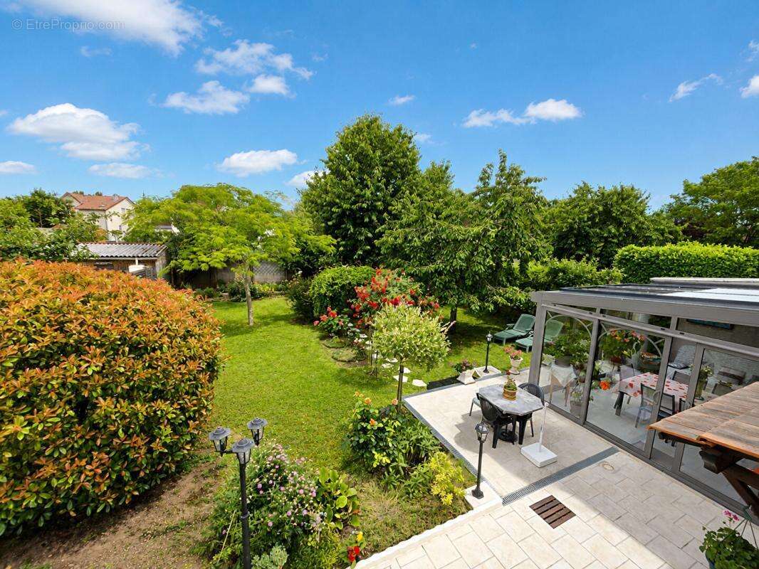 Maison individuelle avec 4 chambres, véranda et magnifique jardin - 175 M2 utiles - photo 3