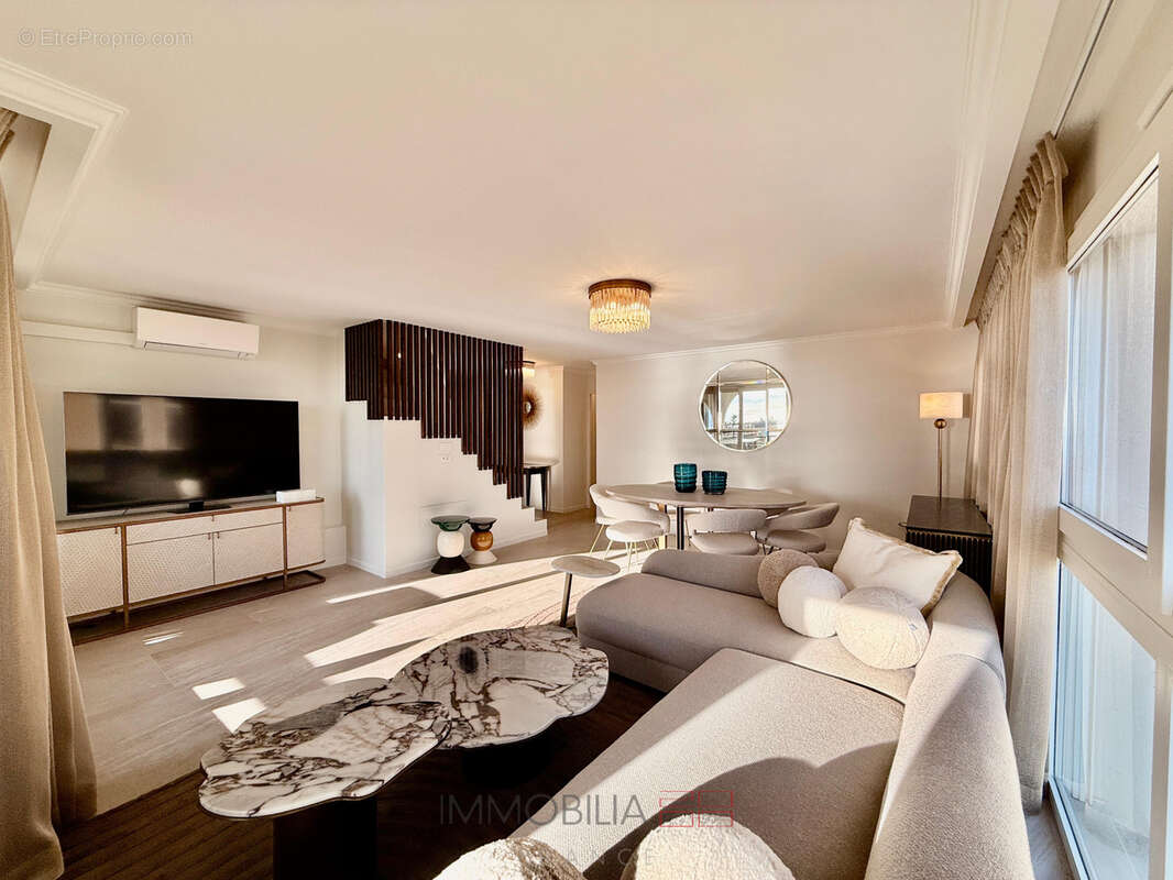 Appartement rénové avec des materiaux de luxe - garage et cave - photo 5