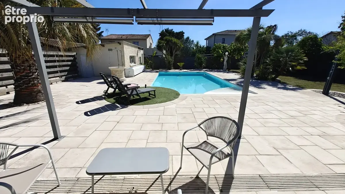PAREMPUYRE - Charmante maison de plain-pied avec piscine, véranda & DPE B - photo 6