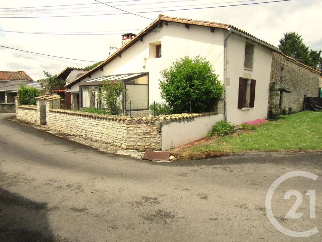 Maison à ENSIGNE