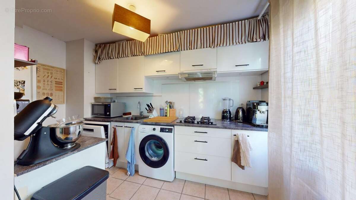  Lyon 4ᵉ – Croix-Rousse  Appartement 2 pièces avec balcon, cave et garage en option ! - photo 6
