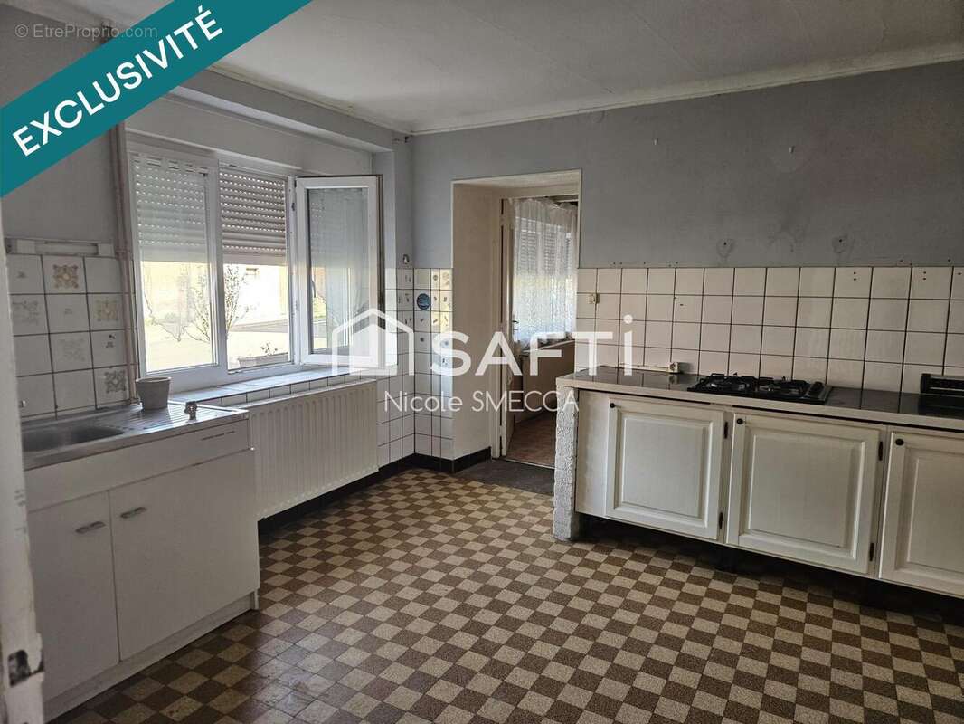 Maison 114 m² à Fleville-Lixieres  - photo 4
