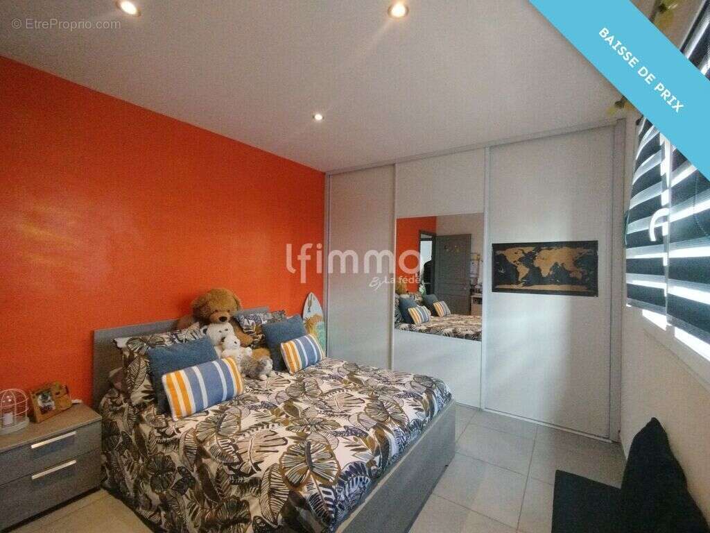 Maison 3 faces - 130 m2 - 5 chambres - Theza - photo 14