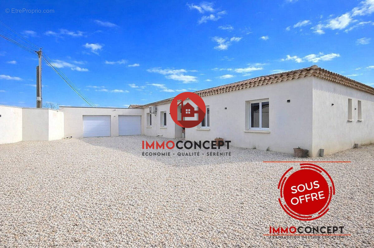 Maison à LAUDUN-L'ARDOISE