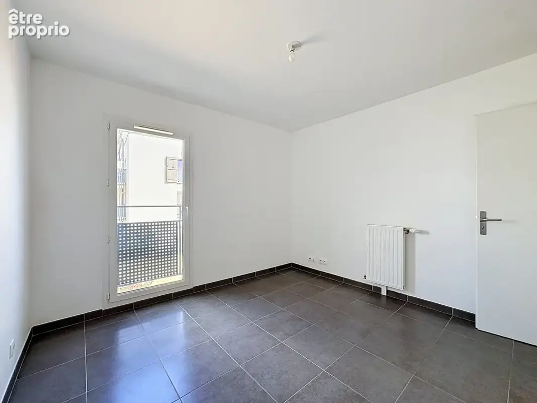 T2 centre bourg chessy de 40.33m2 avec place de parking en sous sol - photo 8