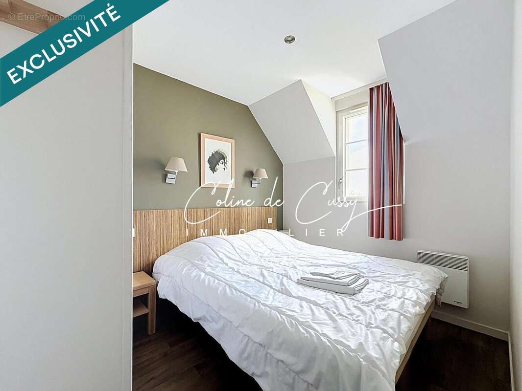 Maison 61 m² à Port-En-Bessin-Huppain  - photo 8