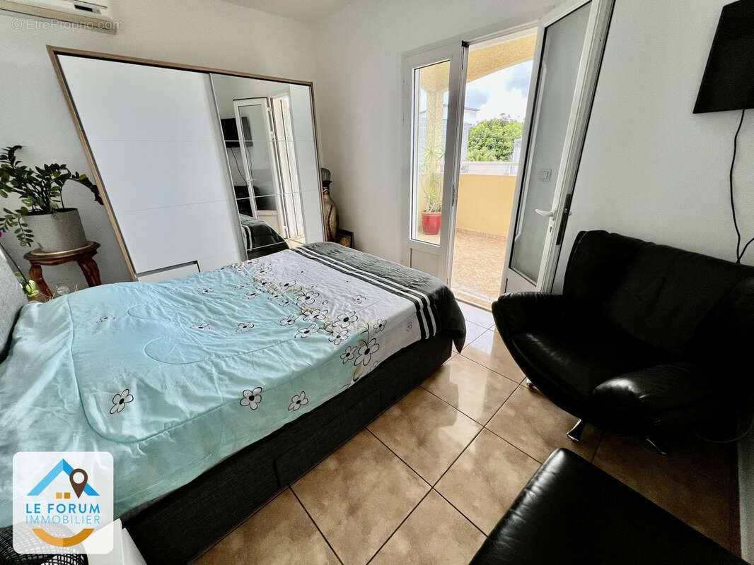 Saint pierre 97410 - villa f4 saine et fonctionnelle - beaux volumes - a etage - commodites a proximite - photo 11