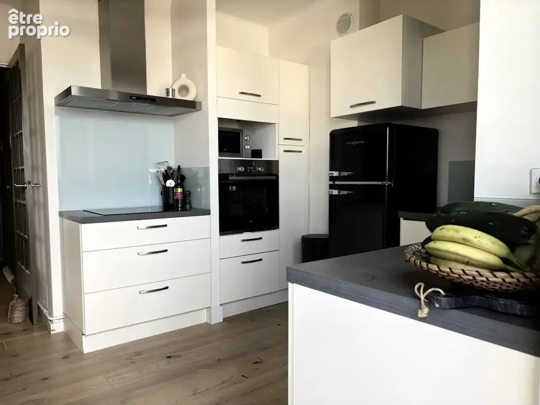 Appartement traversant 86,70 m² rénové avec goût au 6e et dernier étage avec balcons, parking et cave dans résidence de standing - photo 9