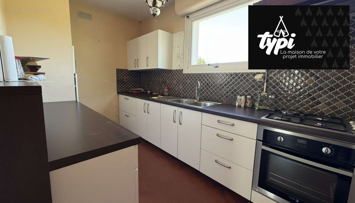 Maison 106 m² à Caudan  - photo 2