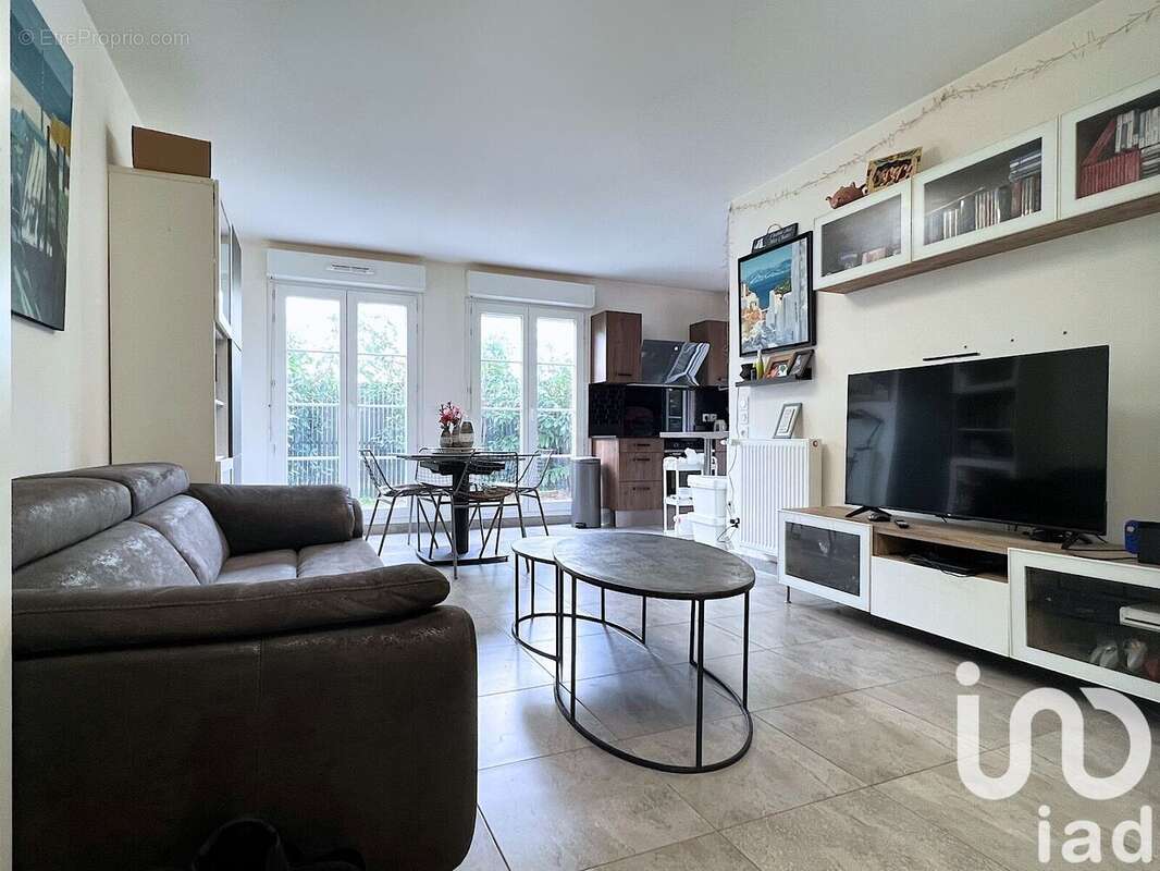 Appartement 61 m² à Villeneuve-Saint-Denis  - photo 2