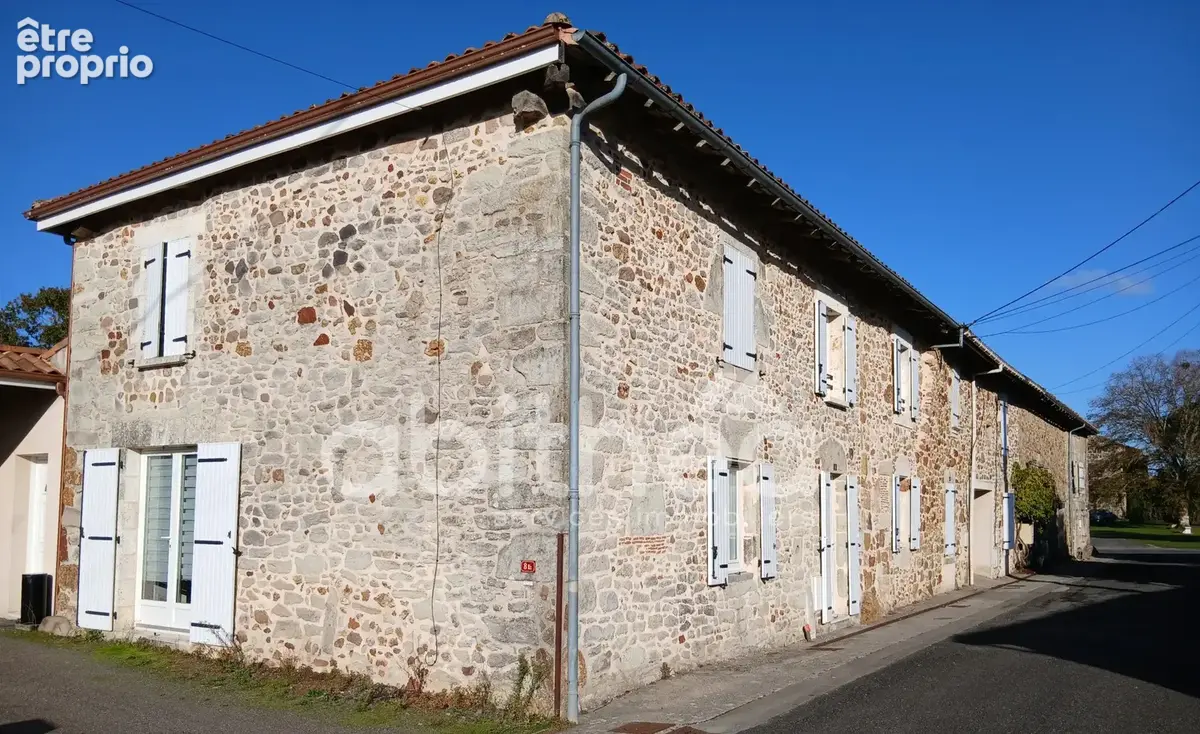 Ensemble immobilier de quatre maisons louées et terrain constructible - photo 1