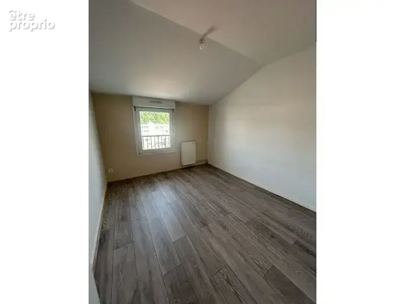Appartement 4 pièces 85 m² à vendre à Le Chambon-Feugerolles (42500) - photo 5