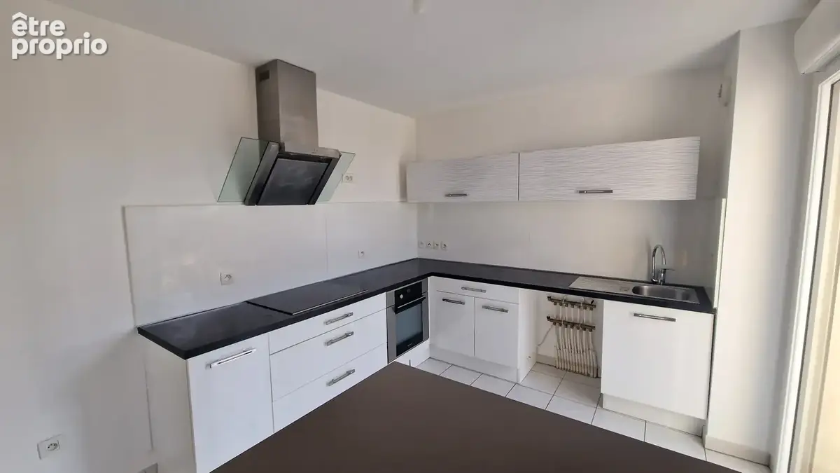 À vendre : Bel appartement 3 pièces avec balcon plein sud et parking en sous-sol - photo 3