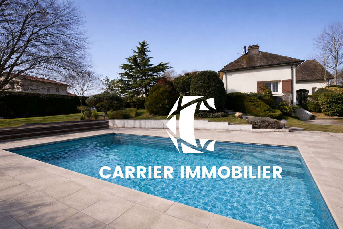 Maison à SAINT-GENIS-LES-OLLIERES