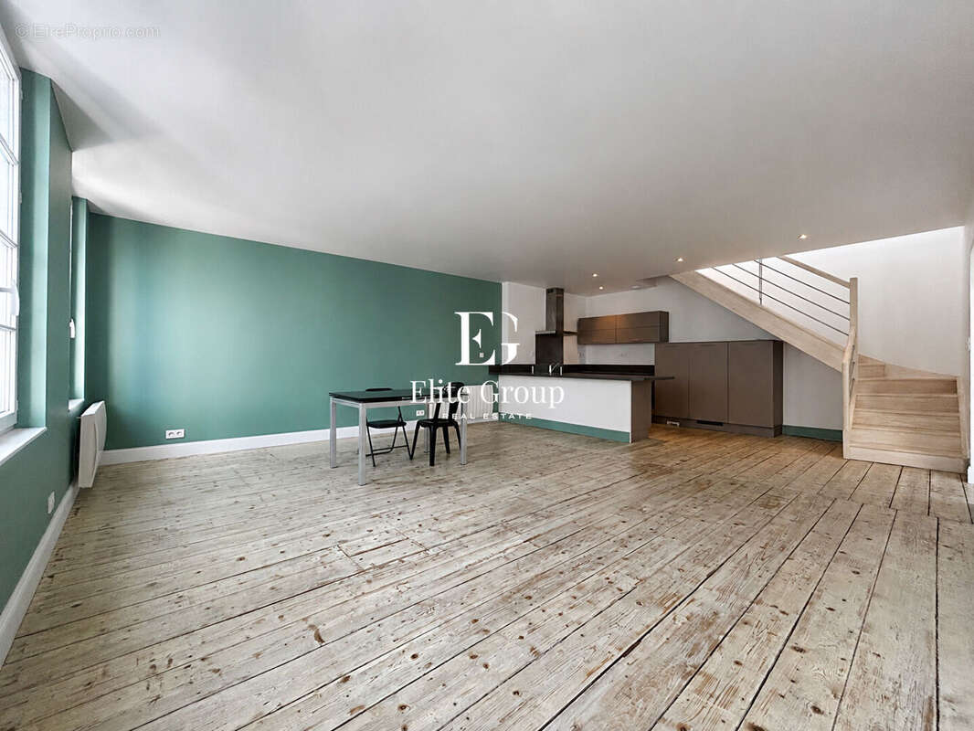 Élégant appartement esprit maison de ville avec terrasse sur les toits - photo 3