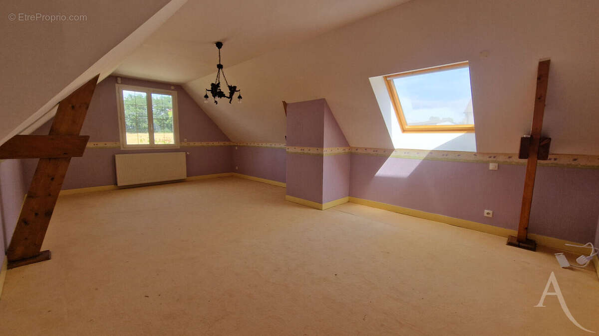 Belle demeure de 342m²  avec piscine intérieur, sous-sol total dans le village de FAVRIEUX - photo 11