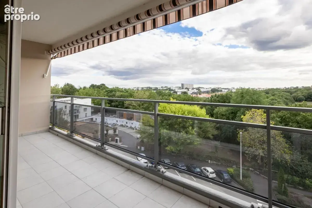 Appartement T3 72m² avec balcon plein sud - Box en sous-sol - photo 10