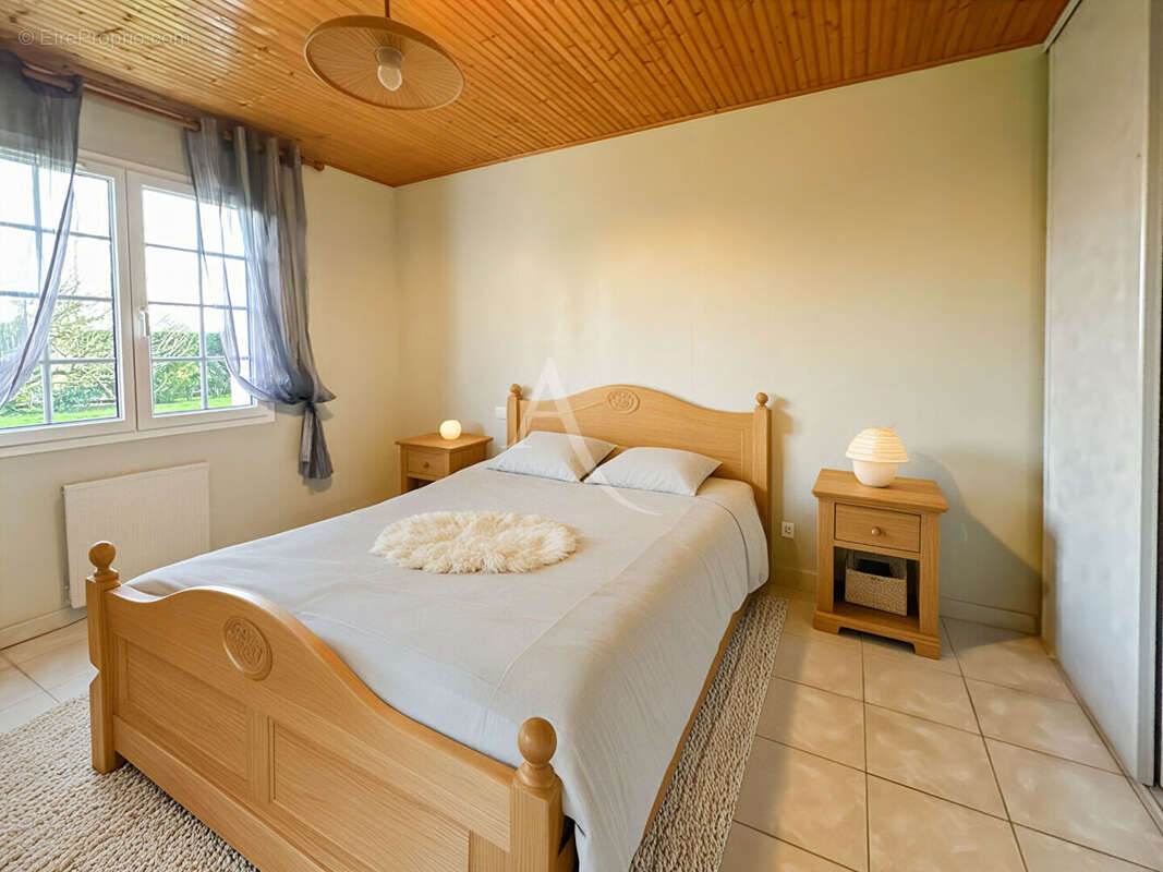 A vendre proche du bourg en impasse - Maison de plain-pied - photo 10