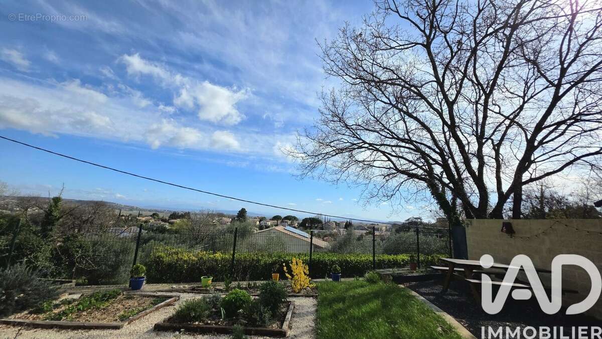 Photo 3 - Maison à SAINT-JULIEN-DE-PEYROLAS